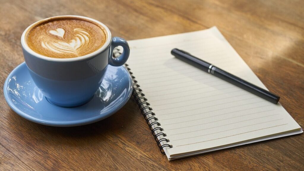 coffee, pen, notebook